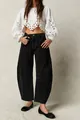 Detailed view of women's black wide-leg washed denim jeans with structured seams - S / Bottoms / Black