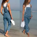 Front and back view of stylish women's slim blue denim overalls on a sunny beach - S / Top And Bottom / Dark Blue
