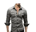 Detailed view of men's washed gray denim shirt with double pockets and snap buttons. - S / Tops / Light Gray