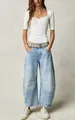 Full-length view of women's loose wide-leg washed denim jeans in light blue. - S / Bottoms / Light Blue