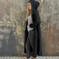 Side view of a premium long black hooded cable-knit cardigan sweater for women. - S / Tops / Black