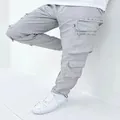 Detailed side view of grey cargo pants for men with multiple functional pockets - S / Bottoms / Gray