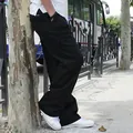 Pantalones cargo negros de talla grande para hombre en un estilo callejero informal fuera - Negro