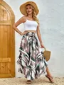 Bohemian style A-line skirt with unique abstract leaf print and smocked waist. - XS / Bottoms / Dusty Pink And Dark Green Leaf Print