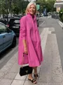 Full body shot of a pink cotton linen shirt dress worn by a model in a street setting - M / Top And Bottom / Pink