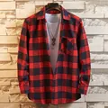 Men's red and black plaid flannel shirt with a brushed finish, hanging on a wooden hanger. - L / Tops / Red/Black Plaid
