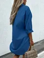 Back view of a comfortable long-sleeved blue cotton shirt dress with a relaxed loose fit - S / Tops / Blue