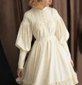 Detail of a vintage cream maid style dress featuring puff sleeves and button cuffs - S / Top And Bottom / Off White