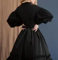Back view of black Japanese maid dress with a large waist bow and ruffled hem - S / Top And Bottom / Black