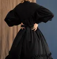 Back view of black Japanese maid dress with a large waist bow and ruffled hem - Black
