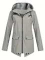 Front view of women's grey lightweight hooded windbreaker jacket featuring striped lining - S / Tops / Gray