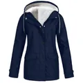 Detail of navy blue hooded winter jacket featuring soft white fleece lining and pockets - S / Tops / Navy Blue