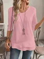 Close-up of pink casual top featuring a unique layered asymmetrical hem and soft texture - S / Tops / Pink