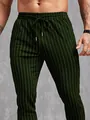 Detailweergave van de donkergroene verticaal gestreepte heren vrijetijdsbroek met koord - M / Bottoms / Groen