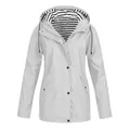 Front view detail of a white waterproof outdoor climbing jacket with striped hood lining - White