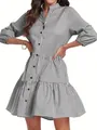 A stylish women's black and white gingham shirt dress with a tiered ruffled skirt. - S / Tops / Black