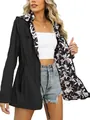 Detail view of women's slim-fit waterproof windbreaker with floral lining - S / Tops / Black