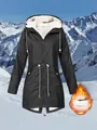 Close-up view of black fleece-lined outdoor jacket against a snowy mountain backdrop - S / Tops / Black