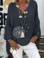 Close-up of a women's V-neck linen blouse featuring a white dandelion floral design - S / Tops / Navy Blue