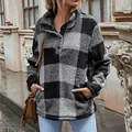 Detailed shot of a women's plaid sherpa fleece pullover with a cozy snap funnel neck - S / Tops / Black