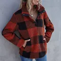Detail view of oversized red and black buffalo plaid fleece sweatshirt with buttoned collar - S / Tops / Red