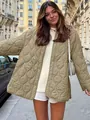 Stylish women's olive green quilted jacket with round neck and loose fit for autumn winter - S / Tops / Khaki