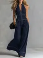 Damen Jumpsuit in Dunkelblau mit Neckholder und weißen Kontrastnähten in voller Ansicht - S / Oberteil und Hose / Marineblau