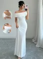 Detailed view of white off-shoulder ruched maxi dress with elegant floor-length hem - S / White