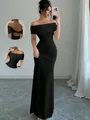 Elegant off-shoulder black bodycon maxi dress with stylish backless detail for women - S / Black