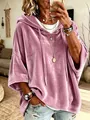 Detalle de una sudadera con capucha de terciopelo rosa para mujer con mangas 3/4 y estilo. - Rosa
