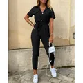 Mono utilitario negro de manga corta con cinturón y cuello de solapa elegante - S / Monos / Negro