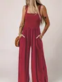 Vista dettagliata di una tuta bordeaux a gamba larga con vita alta e tasche laterali. - 1XL / Top E Pantaloni / Rosso