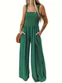 Vista dettagliata di una tuta verde con corpetto a punto smock e gamba larga chic - 1XL / Top E Pantaloni / Verde