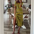 Modisches gelb-schwarz gestreiftes Maxikleid mit Seitenschlitz und V-Ausschnitt - S / Oberteil und Hose / Gelb