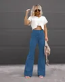 Fashionable blue high-waisted corduroy flare pants styled with a trendy white crop top. - Blue