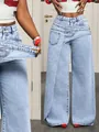 Detail view of trendy light blue wide-leg denim jeans with asymmetric overlap waist design - S / Bottoms / Blue