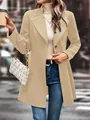 Elegant beige wool coat with lapels shown in a stylish outdoor street setting. - S / Tops / Apricot