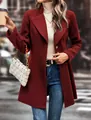 Burgundy solid color lapel woolen coat worn by a model in a street style setting - S / Tops / Red