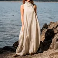 Detailed view of women's beige sleeveless cotton maxi dress with a relaxed high neck design - S / Top And Bottom / Khaki