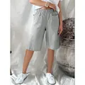 Detailed view of women's vintage vertical striped loose casual woven jacquard shorts - S / Bottoms / Light Gray