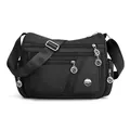 Black waterproof nylon crossbody bag featuring multiple zipper compartments and adjustable strap - Black