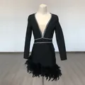 Detailed view of black bandage mini dress with deep V rhinestones and feather hem - S / Top And Bottom / Black (With Waist Rhinestone Chain)