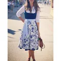 Elegant women's Oktoberfest Dirndl dress with floral skirt and white lace details - S / Top And Bottom / Blue