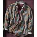 Detailed view of a vintage blue and orange plaid woven flannel shirt with chest pocket - S / Tops / Matcha Green