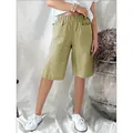 Vintage olive green vertical striped wide-leg shorts with elastic waist for women - Earthy Yellow