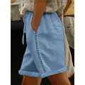 Detail view of women's casual blue shorts showing the side lace hollow patchwork. - Sky Blue