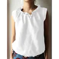 White casual sleeveless cotton linen top featuring a ruffled neck and drawstring hem - S / Tops / White
