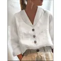 Vista detallada de una camisa informal de algodón y lino blanco con cuello en V para mujer - S / Tops / Marfil