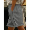 Close-up of casual grey women's shorts featuring delicate side lace hollow-out detail. - Gray