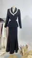 Full view of black French design blazer and maxi skirt set on a mannequin - XS / Top And Bottom / Black